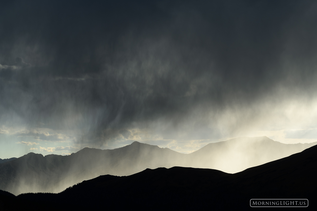 Afternoon Downpour A fast moving rainstorm moves in over the Never Summer Mountains of Rocky Mountain National Park bringing much needed moisture...